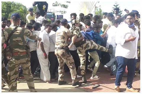 Vikram fans being chased away by CISH jawans at the airport