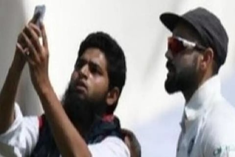 3 Hyd cops suspended after fan breaches security cordon for selfie with Virat Kohli