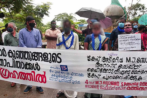 Parents of Walayar sisters during the protest