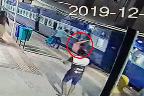 Video: Narrow escape for Karnataka woman after she falls while boarding moving train