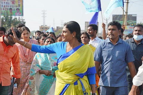 YS Sharmila, dressed in a yellow sari, after she launched her padayatra