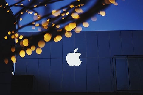 Apple stock market value crosses $900 billion for first time