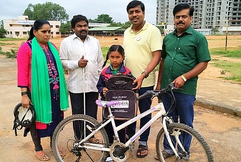 FB post helps visually impaired Bengaluru couple get bicycle for their daughter