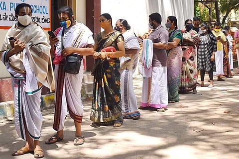 People waiting in line for the COVID-19 vaccine