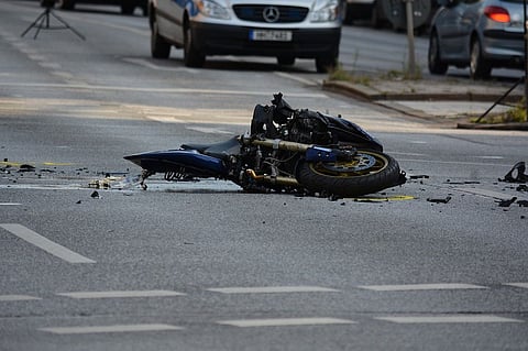 A bike lying on the road after an accident