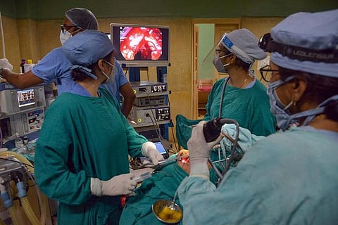 Doctors treating a patient