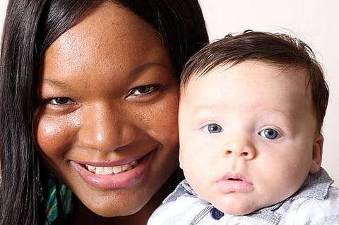 One in a million: Black mother gives birth to white child