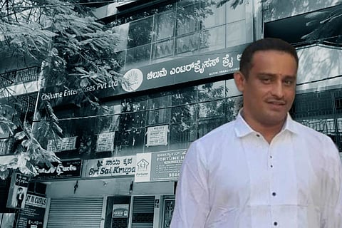 Ravikumar Krishnappa with Chilume office in the background 