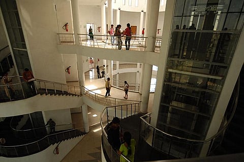 Representative image of students in a college building