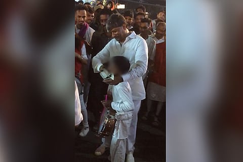 Telangana Deputy Speaker stuffs cash into child’s mouth, says it isn’t a big deal