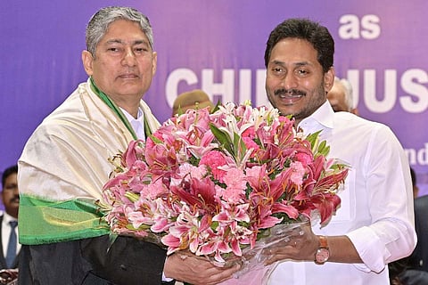 Justice Dhiraj Singh Thakur and CM Jagan Mohan Reddy