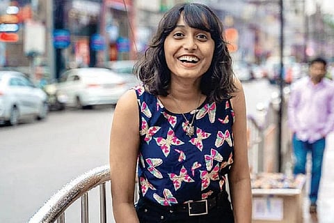 Disha Ravi standing in Brigade Road in Bengaluru