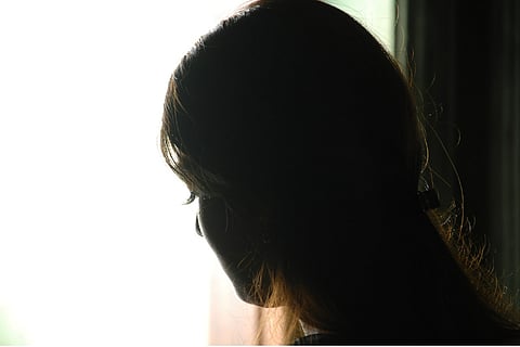 Image featuring a silhouette of a girl
