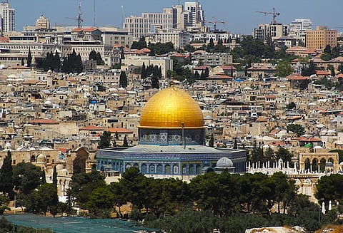 Israel bans Palestinians from buses, backs out after outcry