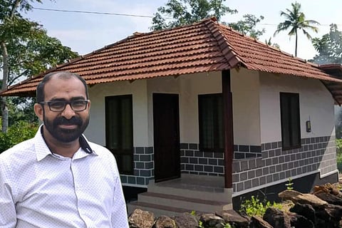 Kerala priest Father Jijo Kurian and a Cabin House he built for the poor