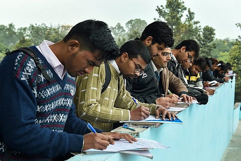 Job aspirants filling up forms