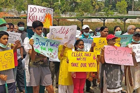  Irked by toxic fumes out of burning garbage, Bengaluru residents hit the streets