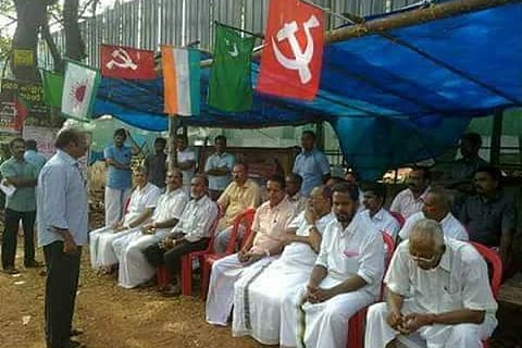Protesters at Malabar Gold jewellery making unit in Kakkanchery, Kerala