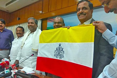 Former CM Siddaramaiah launching the flag in 2018