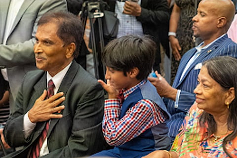 Ken Mathew and his family at the oath-taking event