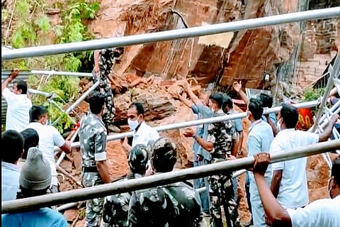Police personnel clearing the scene at Indrakeeladri in Vijayawada