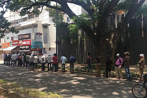 Long queue in front of alcohol store in Indiranagar in Bengaluru