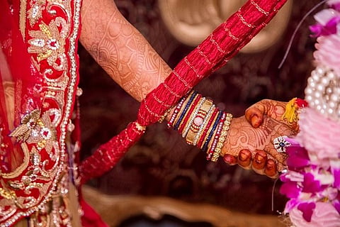 Inside the big fat Indian wedding: conservatism, competition and networks