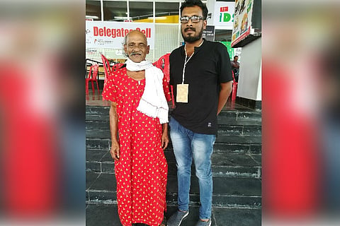 Maxi Maman: Meet the Kerala man protesting injustices in a nightie with half shaved head