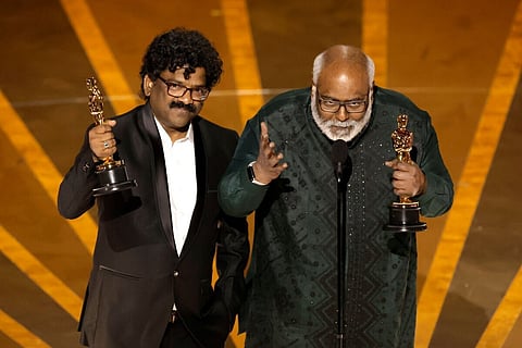 MM Keeravani and Chandrabose at the Oscars stage