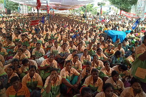 Hundreds of pourakarmikas sitting in protest at Freedom Park