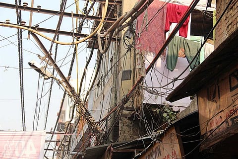 Entangled power lines in a city in India