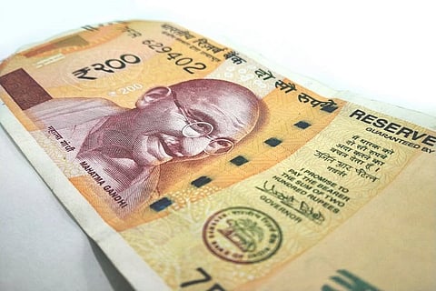 Sustained rupee falling credit-negative for Indian firms: Moody's