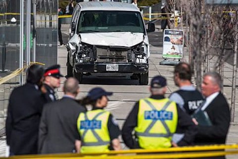 At least 10 killed as van ploughs into pedestrians in Toronto