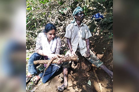 Tribal women collecting tubers in Kerala 