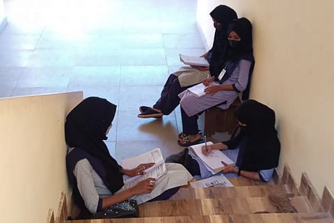 udupi students on staircase