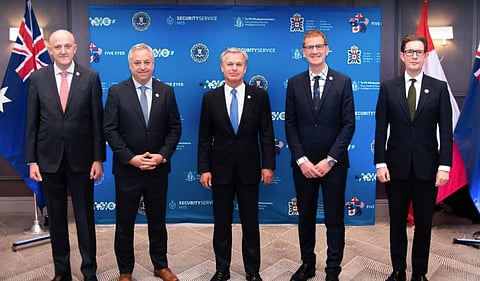 From left to right: Australian Security Intelligence Organisation Director-General Mike Burgess, Canadian Security Intelligence Service Director David Vigneault, FBI Director Christopher Wray, New Zealand Security Intelligence Service Director-General of Security and Chief Executive Andrew Hampton, and MI5 Director General Ken McCallum pose for a group photo during the Emerging Technology and Securing Innovation Summit in Palo Alto, California, on October 16, 2023