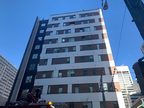 Desk pushed from ninth story downtown Calgary building