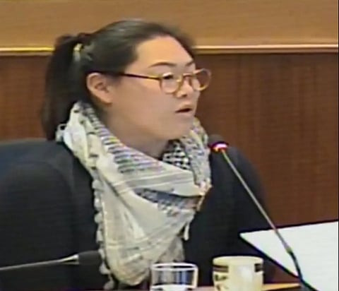 Victoria City Councillor Susan Kim wearing a keffiyeh
