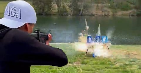 Kid Rock shoots up Bud Light cans