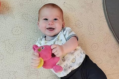 Kfir Bibas (pictured) had just learned to walk when he, along with his brother Ariel, four, and his mother Shiri, 32, was taken from his family's home