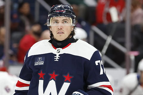Oshie wears neck guard