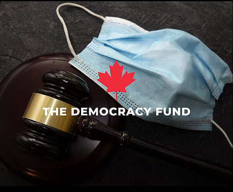 An N95 mask and a gavel
