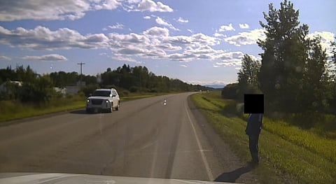 Man shown in front of the RCMP crusier
