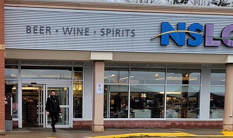 Alleged CBC employee leaving the liquor board store at Fall River, Nova Scotia