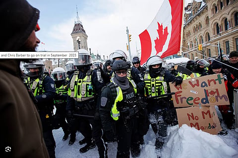Police move in to clear downtown Ottawa near Parliament Hill of protesters after weeks of demonstrations on Feb. 19, 2022.