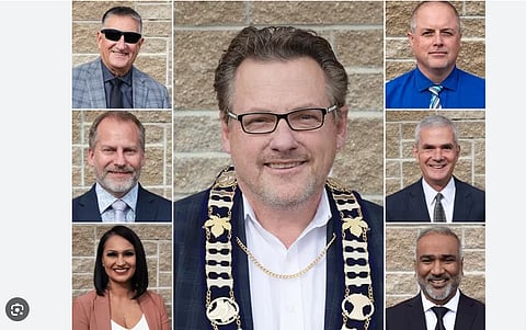 Ousted Alberta mayor Jeff Colvin (centre) racked up boozy bill of $8,500 on city credit card