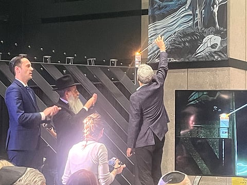 Matt Jones gave the lighting stick to  Nelson Halpern to ignite the first candle. 