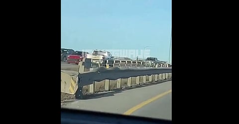 A driver was spotted going the wrong way on the Queen Elizabeth II Highway on Sunday. 