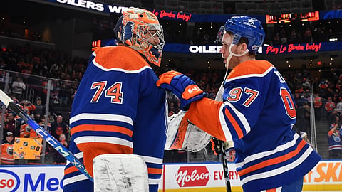 Oilers captain Connor McDavid congratulates star of the game Stuart Skinner following a 4-1 win against Columbus January 23, 2024