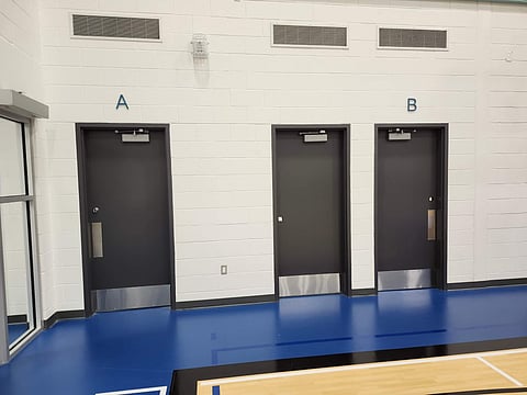 The changerooms at St. Pius X Catholic School in Regina are labelled with A and B. 